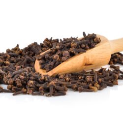 Spice cloves on white background